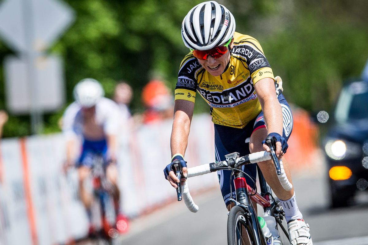 Amber Neben (Dare to Be) crosses the line and holds onto the yellow jersey