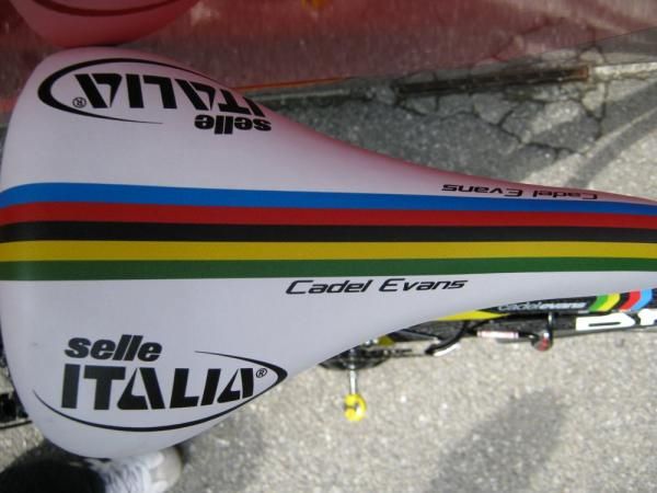 It is a yellow bike with a touch of the rainbow