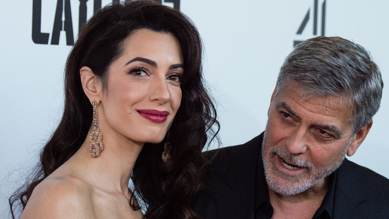 George Clooney in &#039;trouble&#039;, Amal Clooney and George Clooney attend the &quot;Catch 22&quot; UK premiere on May 15, 2019 in London, United Kingdom