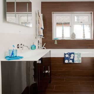 bathroom with bathtub and wash basin