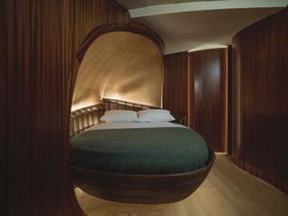Rounded bed inside the Spirit III yacht