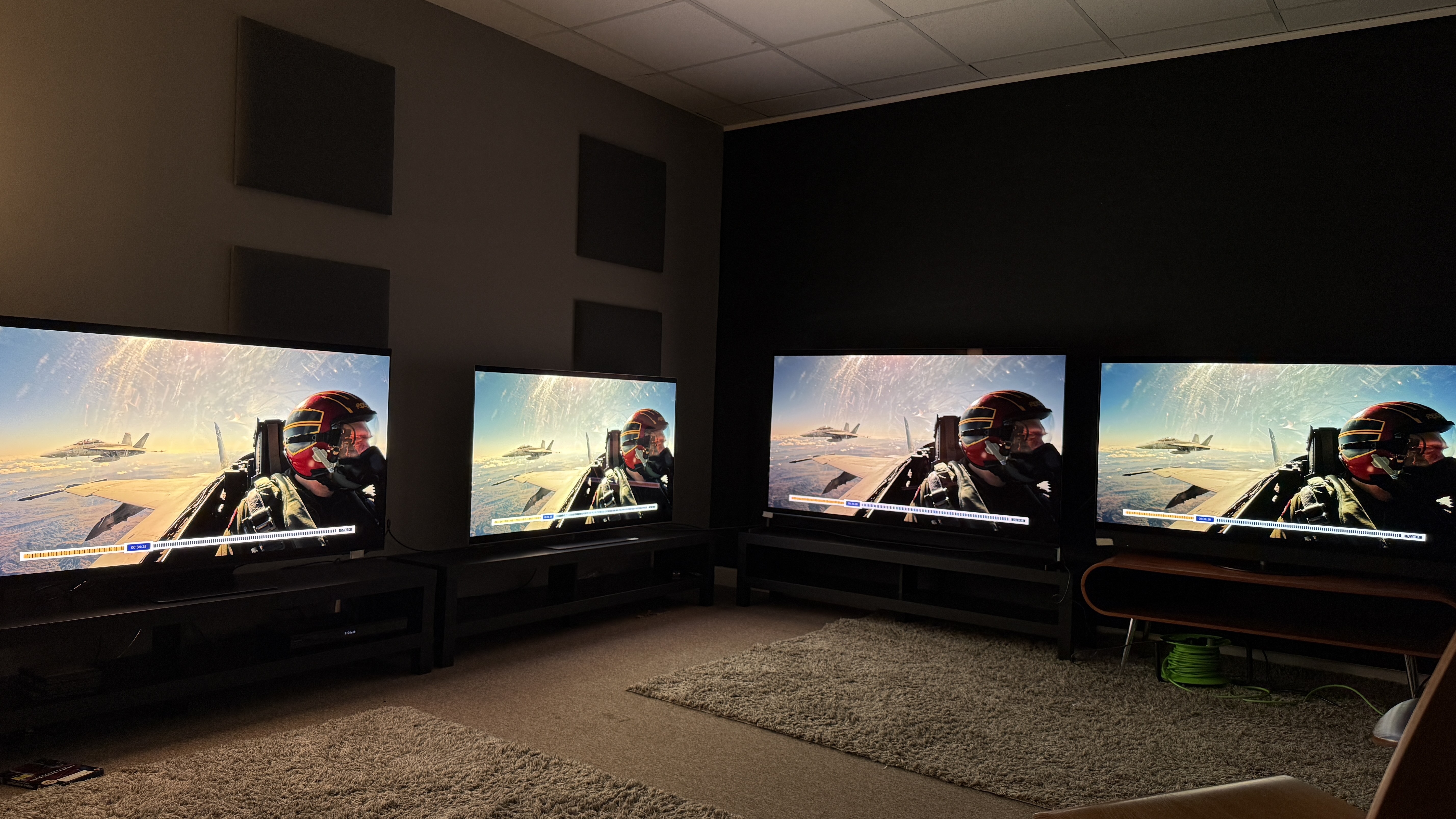 Samsung S95F (far left) LG G5 (middle left) Sony Bravia 8 II (middle right) Panasonic Z95B (far right) OLED TVs all displaying Rooster in cockpit in Top Gun: Maverick