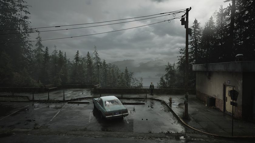 A screenshot of Silent Hill 2&#039;s main protagonist James in a car park looking out across the lake