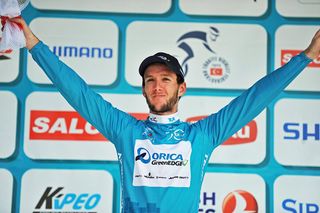 Adam Yates on the podium after retaining his overall lead on Stage 7 of the 2014 Tour of Turkey