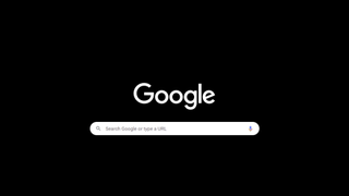 Google's new darker dark mode - it's a pitch black screen with white letter spelling Google