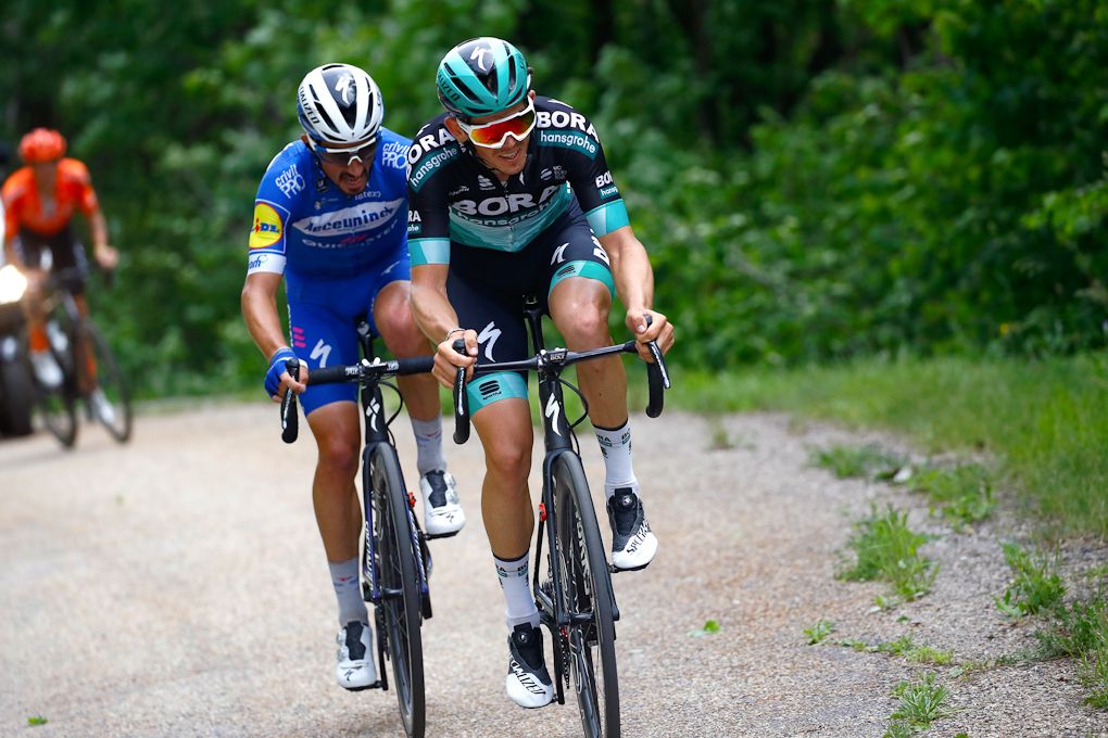 Gregor Muhlberger and Julian Alaphilippe drop Alessandro de Marchi on the way to the finish of stage 6 at Dauphine