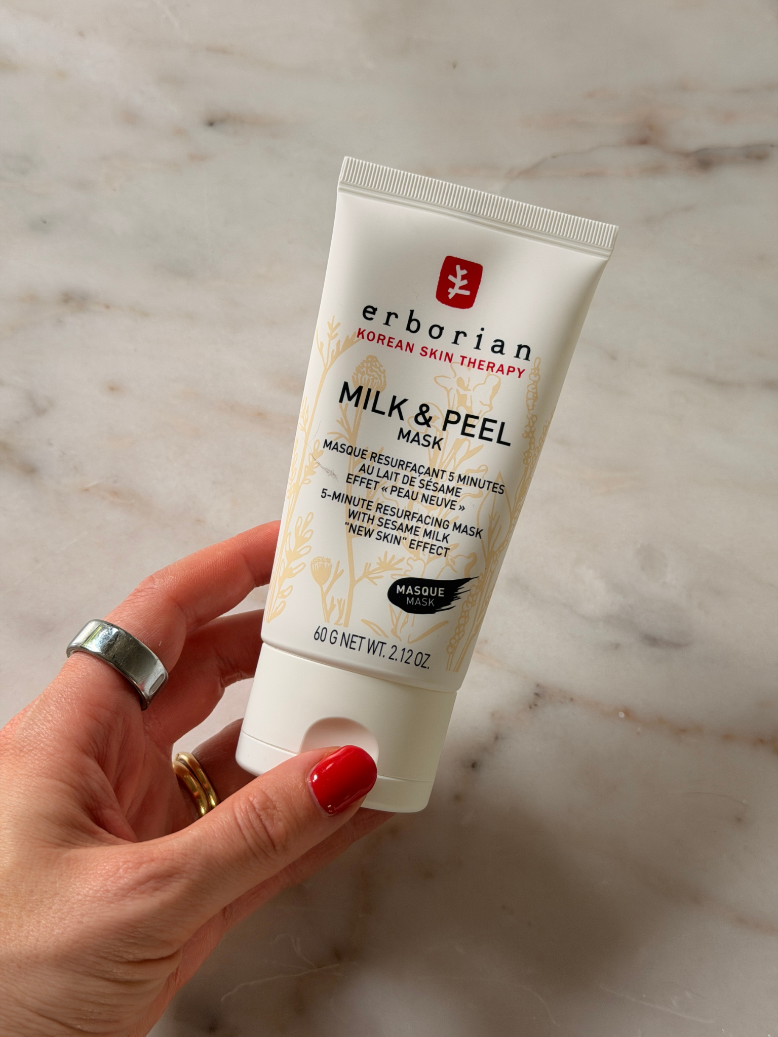 Freelance beauty editor Grace Day holding the Erborian face mask
