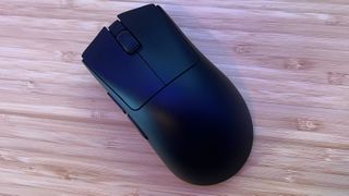 Top down shot of full Razer DeathAdder V3 Hyperspeed on a wooden desk