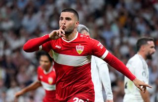 Deniz Undav of VfB Stuttgart celebrates scoring his team's first goal during the UEFA Champions League 2024/25 League Phase MD1 match between Real Madrid CF and VfB Stuttgart at Estadio Santiago Bernabeu on September 17, 2024 in Madrid, Spain.