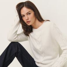 model wearing Reformation Dawson Regenerative Wool Cable Sweater