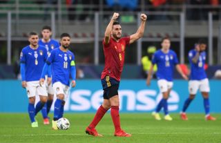 Koke celebrates Spain's second goal, scored by Ferran Torres, in the UEFA Nations League semi-final against Italy in October 2021.