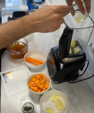 Alex David prepping Butternut Squash soup in the Ninja Foodi Blender & Soup Maker