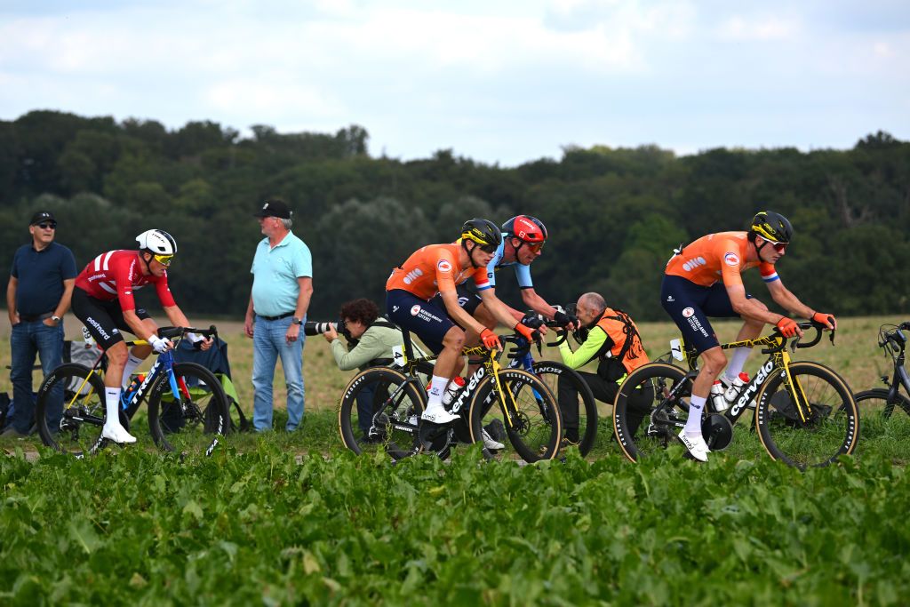 HASSELT BELGIUM SEPTEMBER 15 LR Mads Pedersen of Team Denmark Olav Kooij of Team Netherlands and Mick Van Dijke of Team Netherlands compete during the 30th UEC Road Cycling European Championships 2024 Mens Elite Road Race a 2228km one day race from HeusdenZolder to Hasselt on September 15 2024 in Hasselt Belgium Photo by Luc ClaessenGetty Images