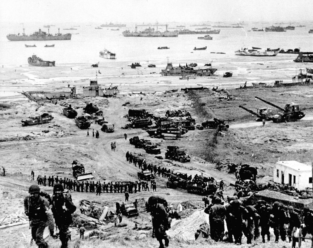 Some of the 150,000 Allied troops involved in D-Day pictured landing at Omaha Beach in Normandy, 6 June 1944.