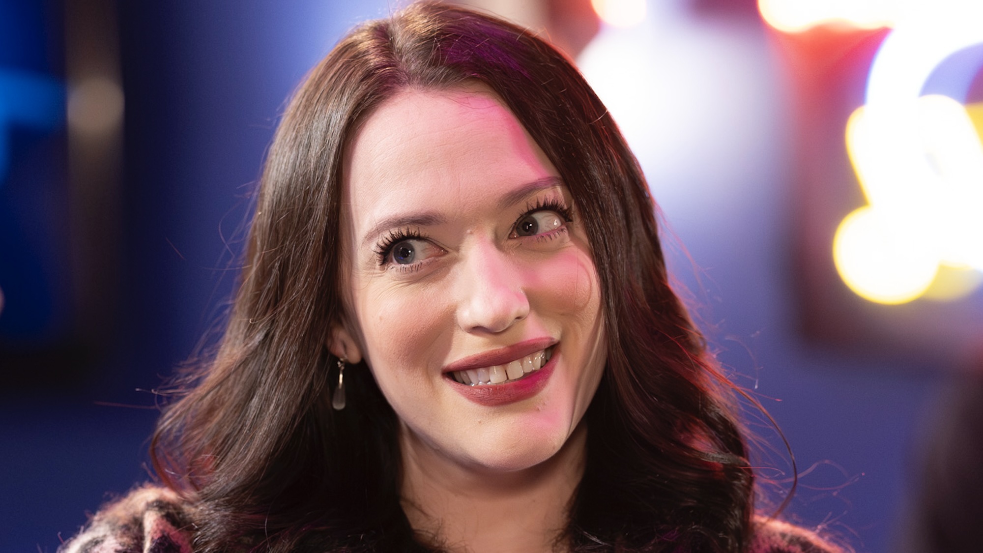 Riley smiling inside karaoke bar in Shifting Gears Season 2
