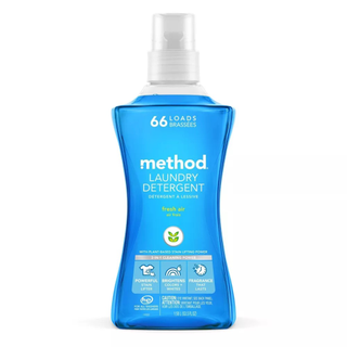 A bottle of blue fresh air scented laundry detergent