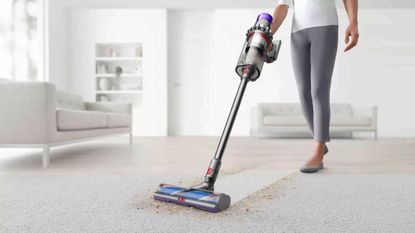 The best prime day vacuum deal: dyson outsize vacuuming on a carpet