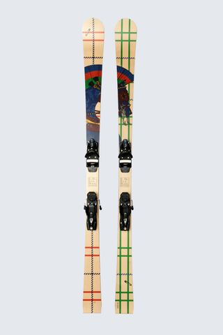 A pair of skis on grey background