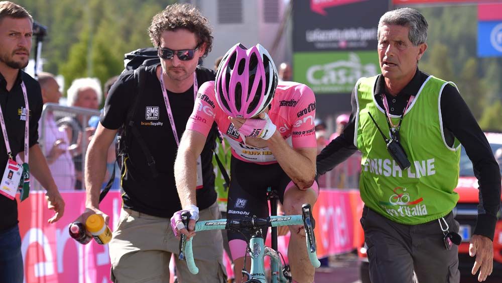 Steven Kruijswijk in despair after losing the Giro d'Italia's maglia rosa following a crash on the descent of the Colle dell'Agnello