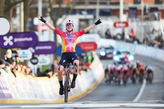 Belgian rider Lotte Kopecky of SD Worx celebrates after winning the womens oneday cycling race Omloop Het Nieuwsblad for the first time part of the Womens World Tour races 1322 km from Gent to Ninove on February 25 2023 Photo by KURT DESPLENTER Belga AFP Belgium OUT Photo by KURT DESPLENTERBelgaAFP via Getty Images