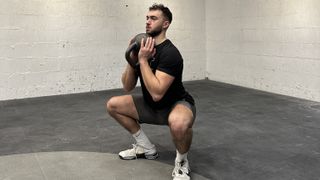 Jordan Shelley performing goblet squat