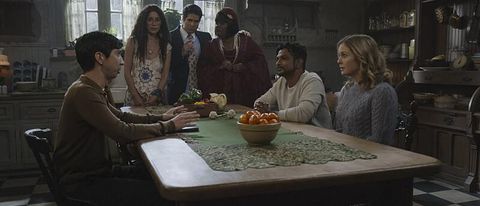 The Ghosts cast sitting around a kitchen table