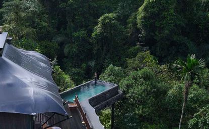 A view overlooking a pool at The Lodge at Capella Ubud — Bali