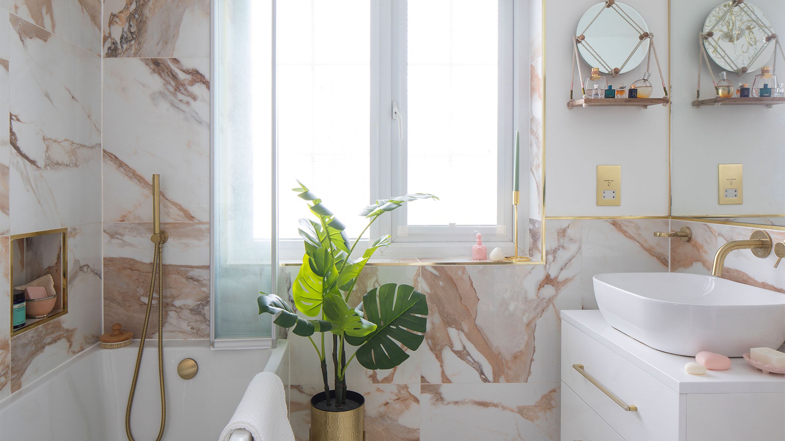 Shower baths have more potential than you might think - here's how to make it look more luxurious while saving space in a bathroom