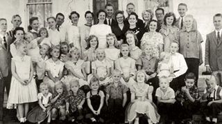 black and white photo of polygamous mormon family in 1958