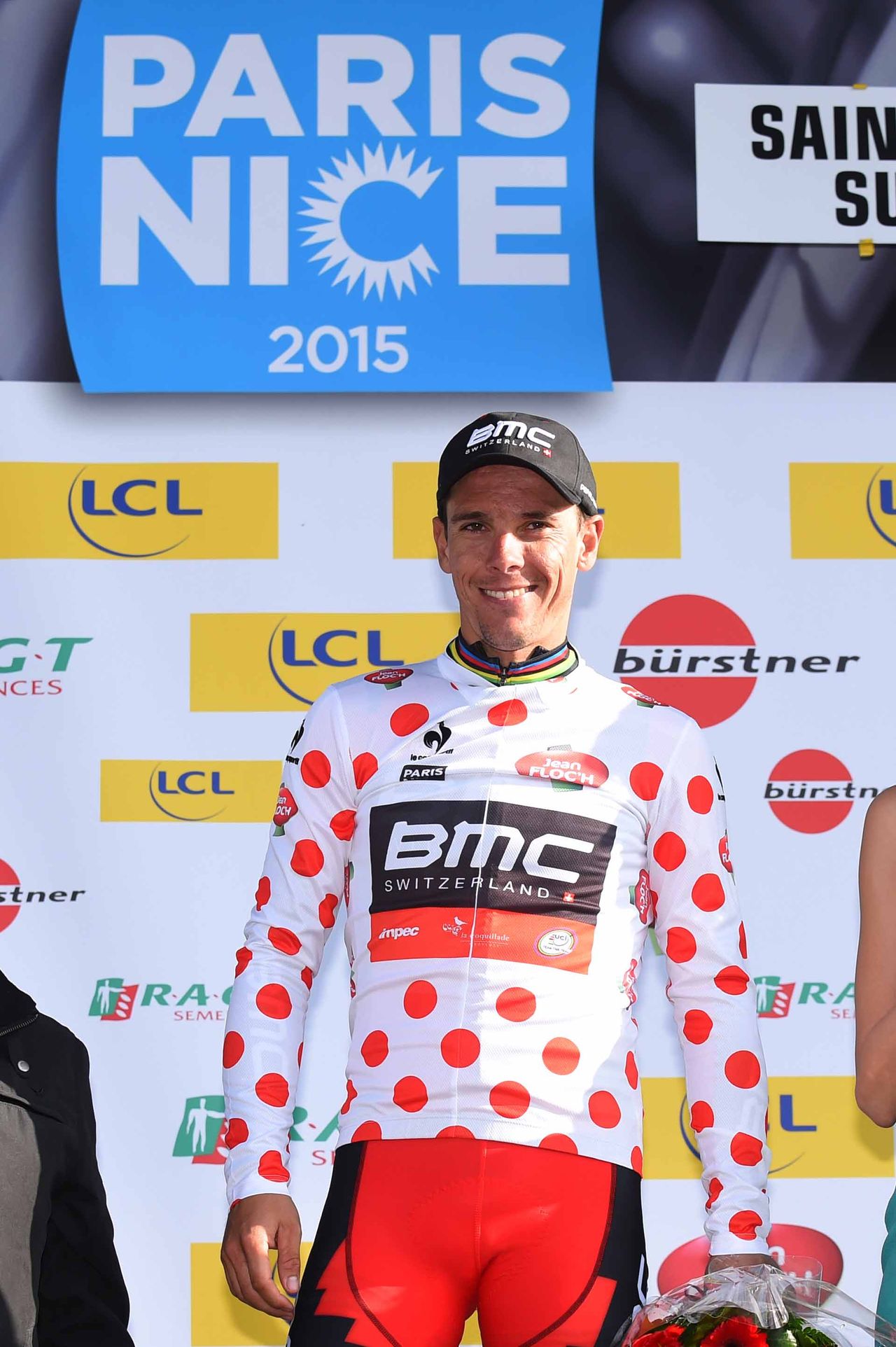 Philippe Gilbert (BMC) enjoys his moment on the podium collecting the polka dot mountains jersey