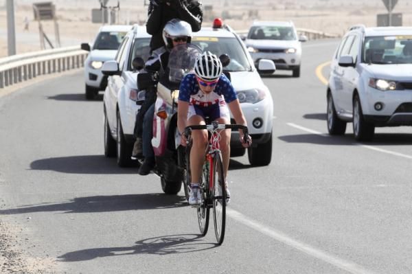 Kendall Ryan (United States) attacked into the headwind on the highway northwards