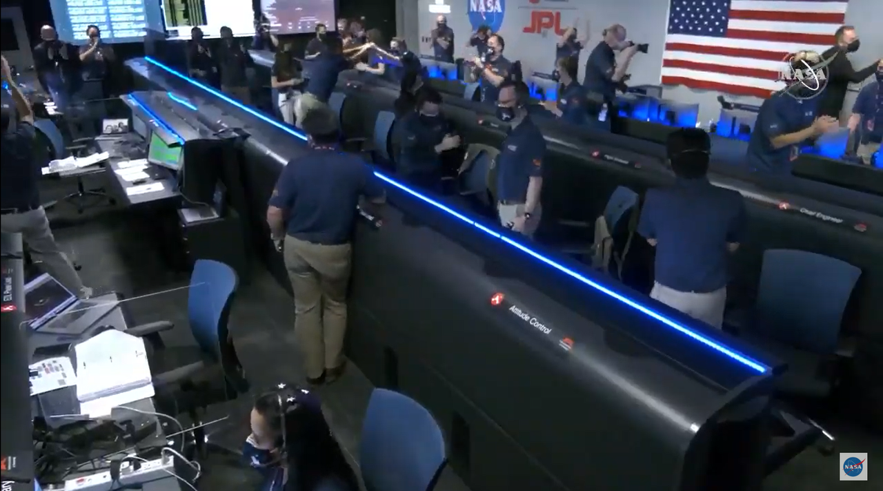 The Perseverance mission control room celebrates the rover's touchdown on Feb. 18, 2021.