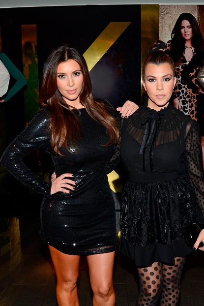 Kourtney and Kim Kardashian at Kardashian Kollection launch party