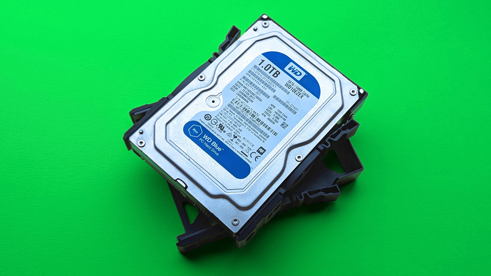 UGREEN NASync DH2300 on a green card paper background