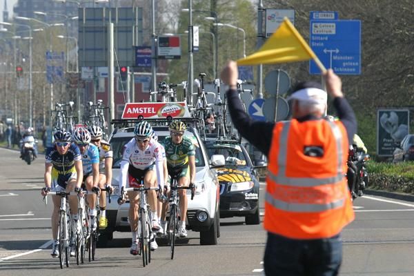 The lead group passes through.