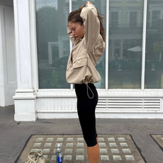 woman wearing capri pants parachute jacket fall outfit 2025