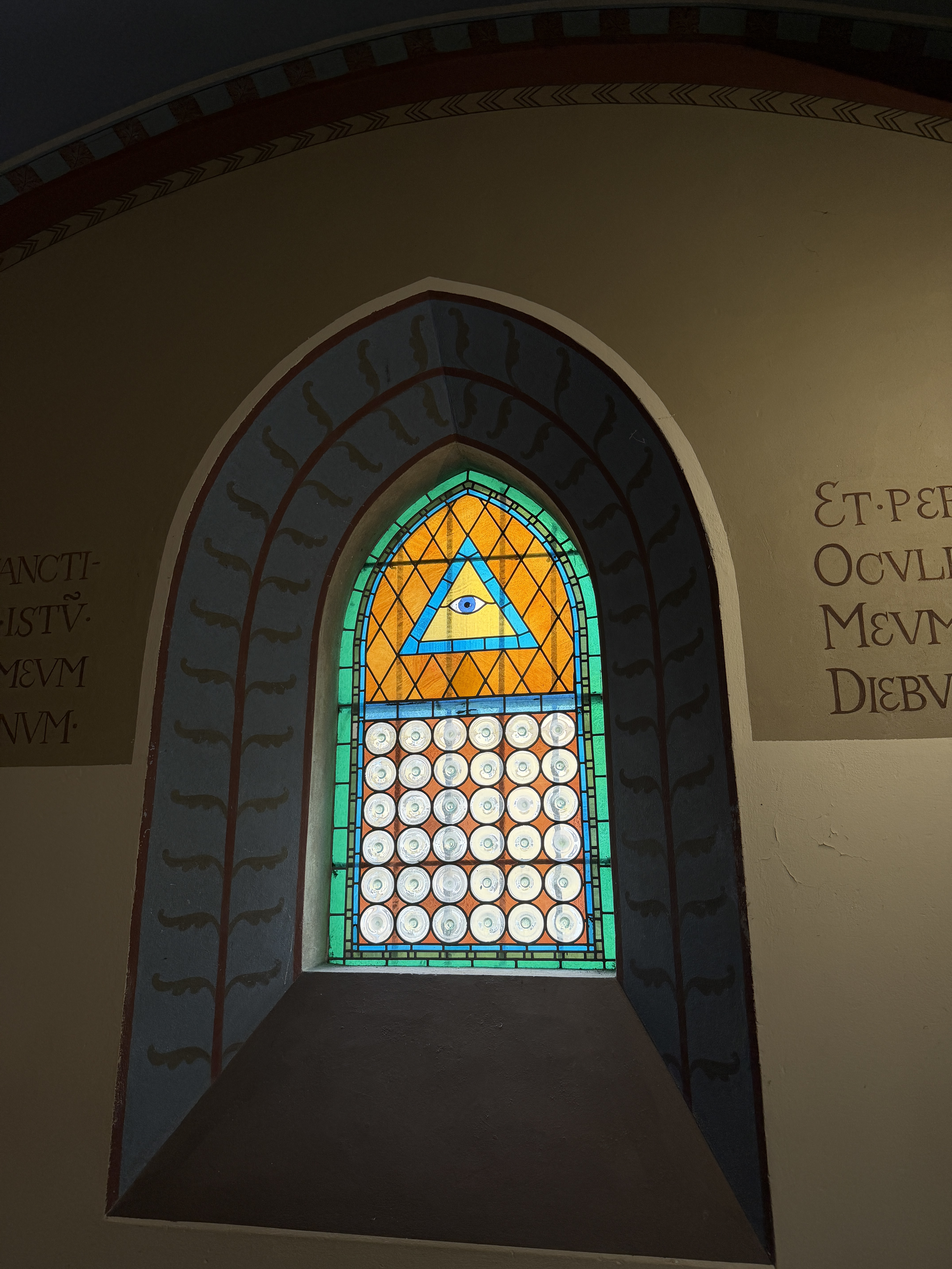 A stained glass window in a church