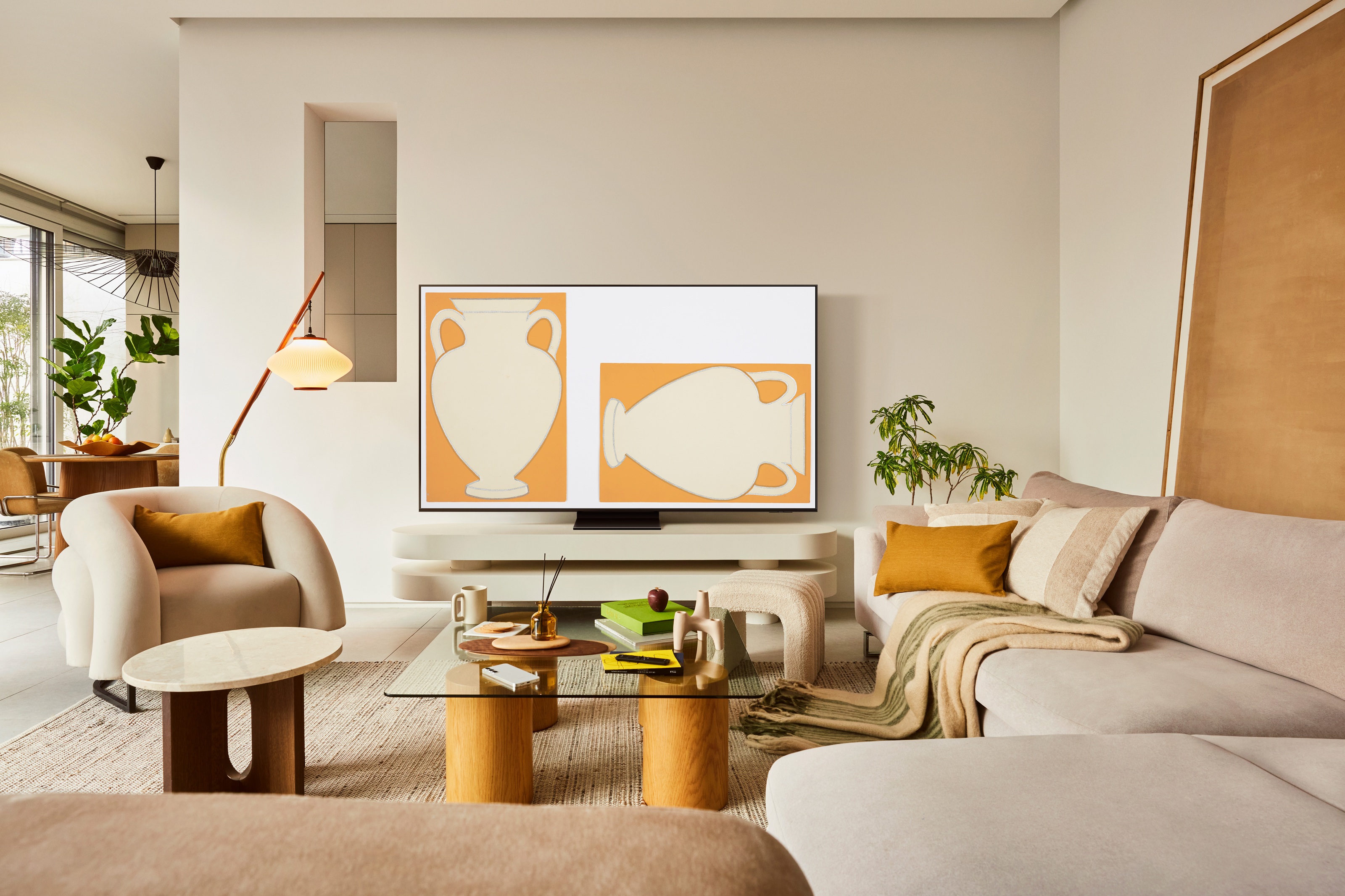 room with modern design aesthetic, and samsung the frame tv displaying artwork