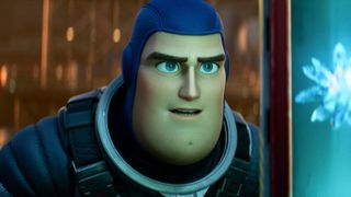 Buzz Lightyear (voiced by Chris Evans) stars at a screen in Lightyear