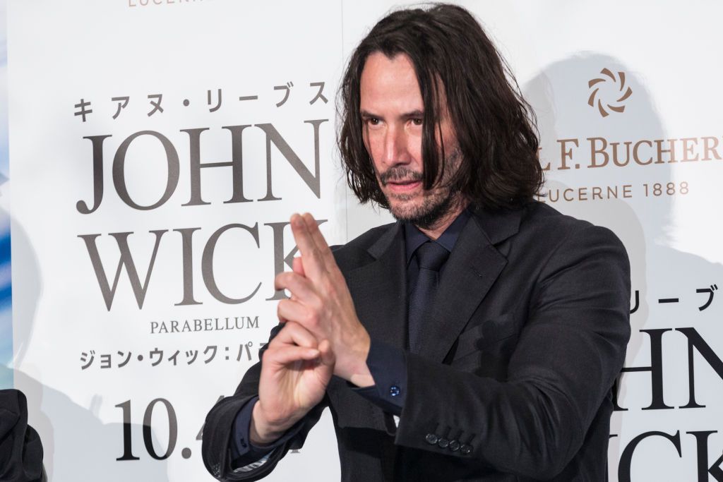 Keanu Reeves pretending his fingers are a gun, as he blows away Mortal Kombat fans&#039; dreams.