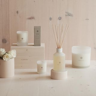 candles with floral scents of rose and neroli,