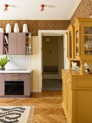 A kitchen with storage above the cabinet