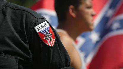 Neo Nazis take part in a Ku Klux Klan demonstration in Columbia, South Carolina last year