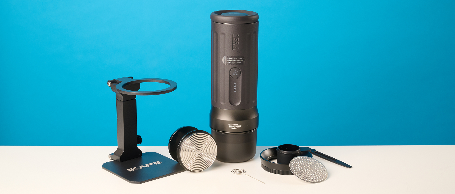 the ikape kapo k2 pro portable coffee maker against a blue background