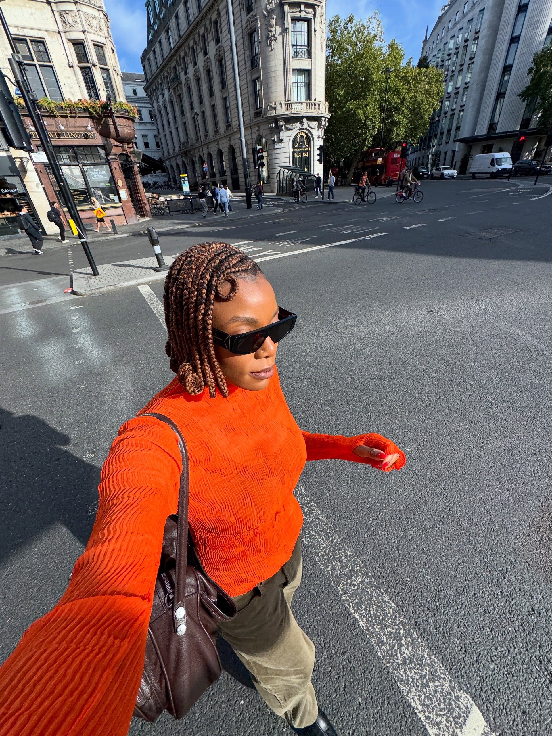 An image of a woman wearing green denim outfit fall 2026