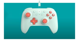 8BitDo Ultimate 2C on a blue background