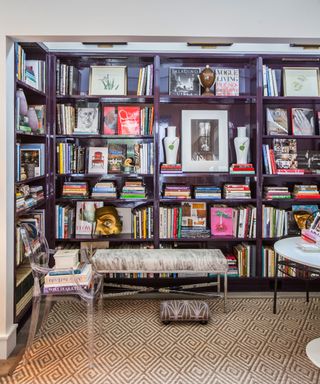 Small library nook with purple bookcases