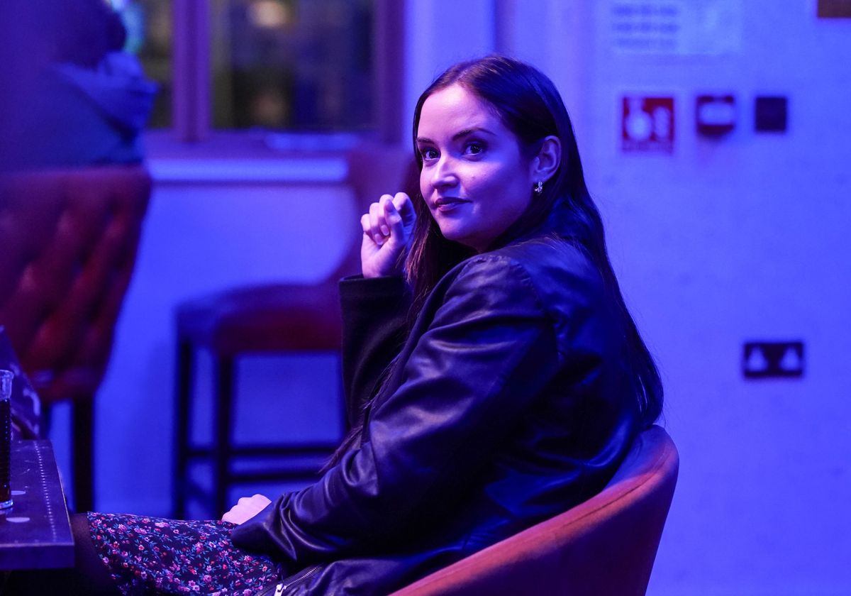 Lauren Branning sitting in a chair at her birthday party in EastEnders