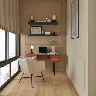 modern home office ideas, home office with stone coloured walls, large window on left, blind, open shelving, desk, and chair, hardwood flooring