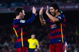 Lionel Messi and Luis Suarez celebrate after Barcelona's seventh goal against Valencia in the Copa del Rey in February 2016.